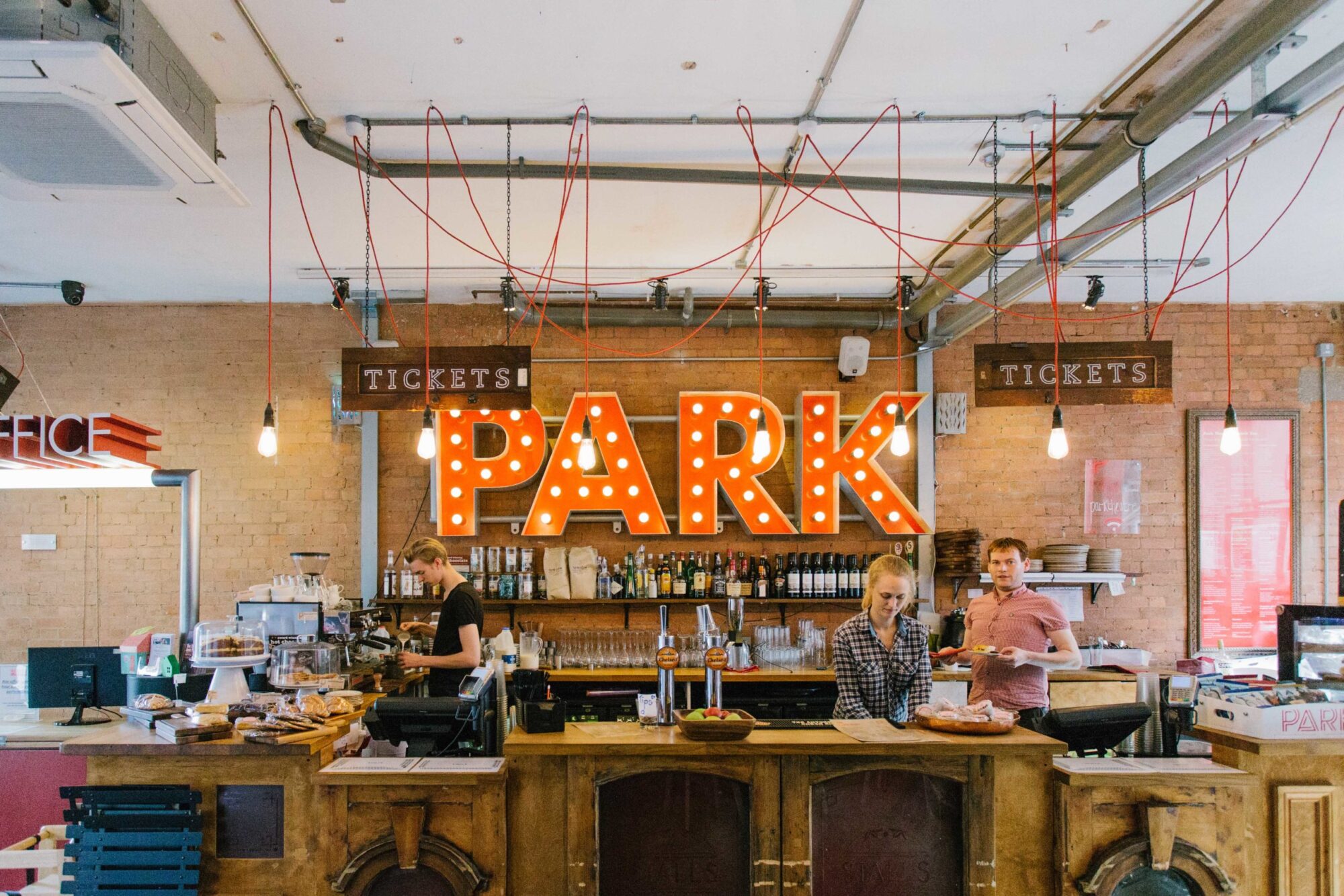 People working in the cafe at The Park Theatre in Stroud Green.