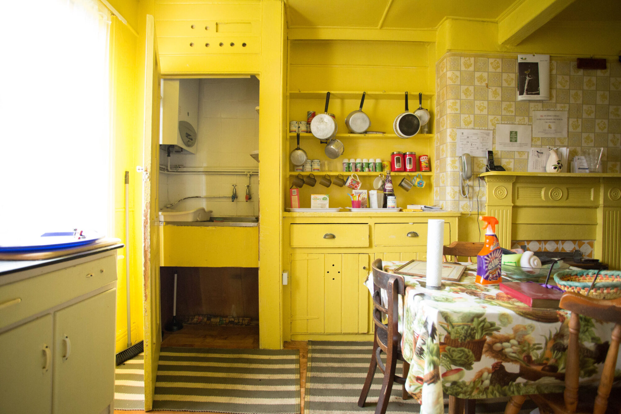 A photo of a kitchen in an old property in need of renovation. 